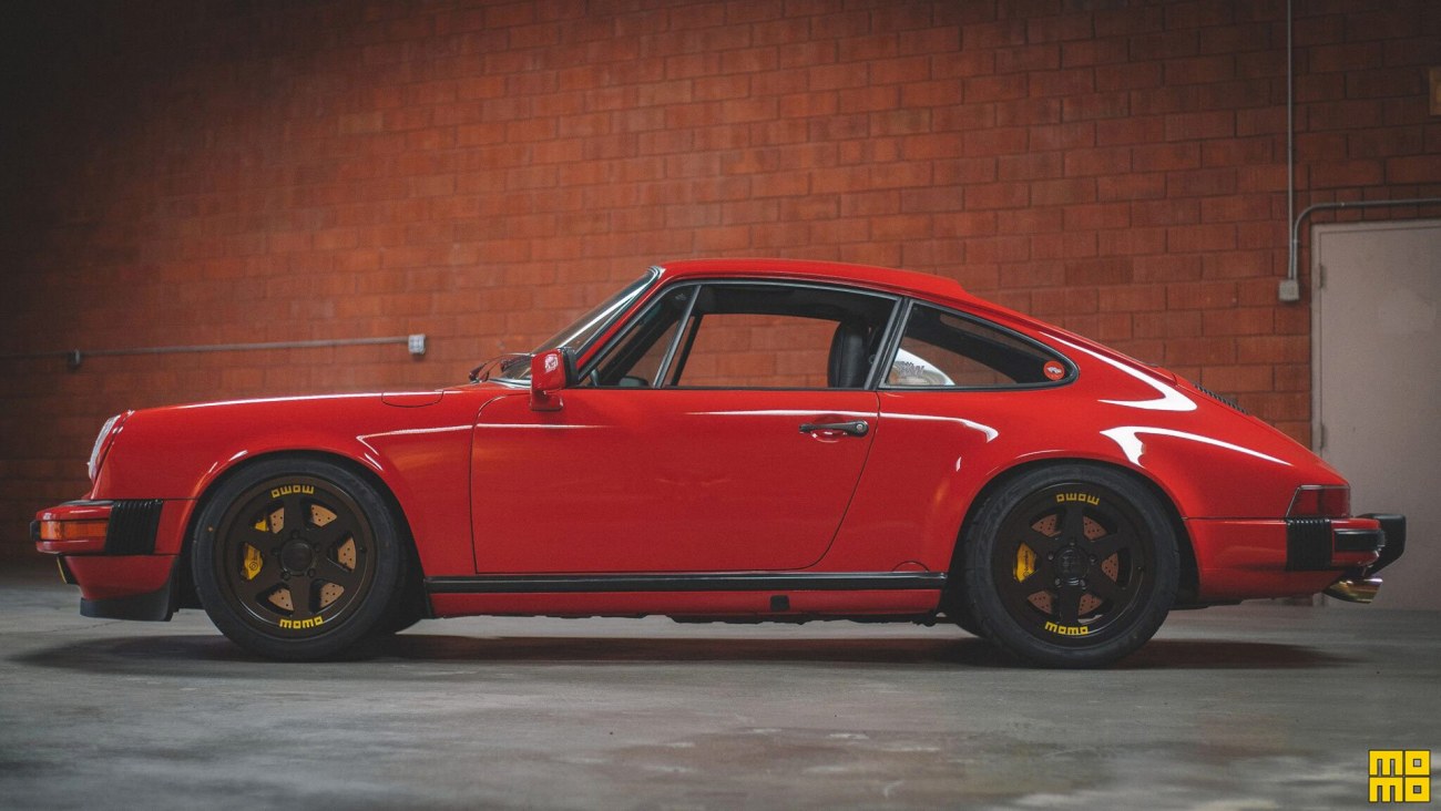 classic-porsche-911-guards-red-black-6-spoke-momo-heritage-wheels-k.thumb.jpg.4a9f6aa896d03b5cb20511c71fa5a082.jpg